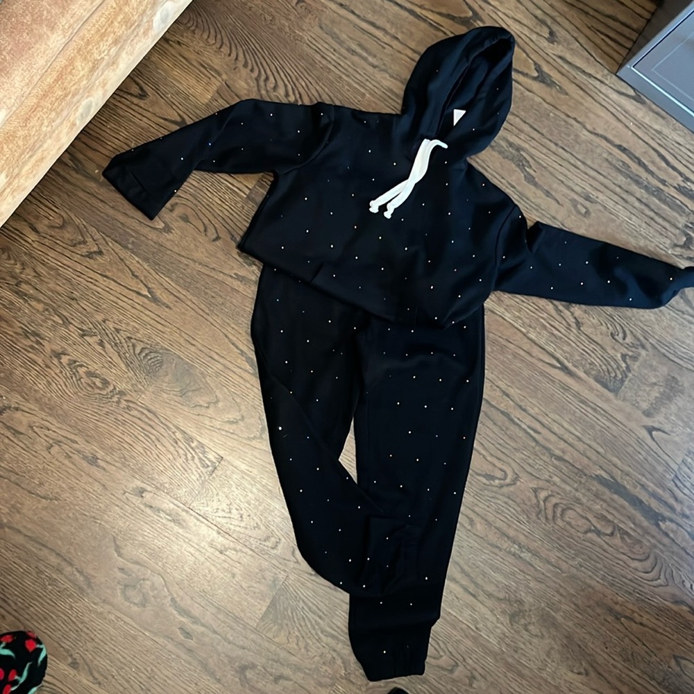 Matching black sweatsuit with rhinestones